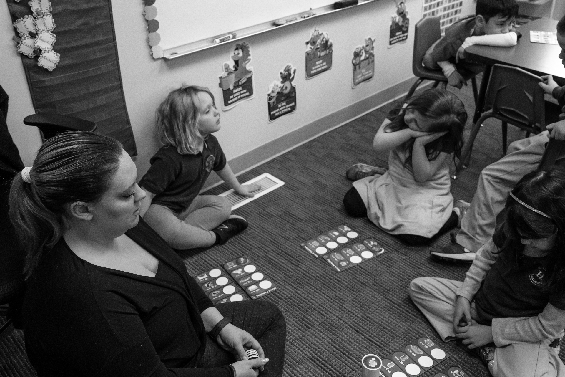 Highland Academy early learners participating in a classroom floor activity